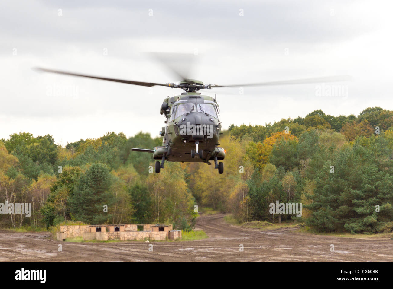 german military helicopter in flights over battlefield Stock Photo Alamy