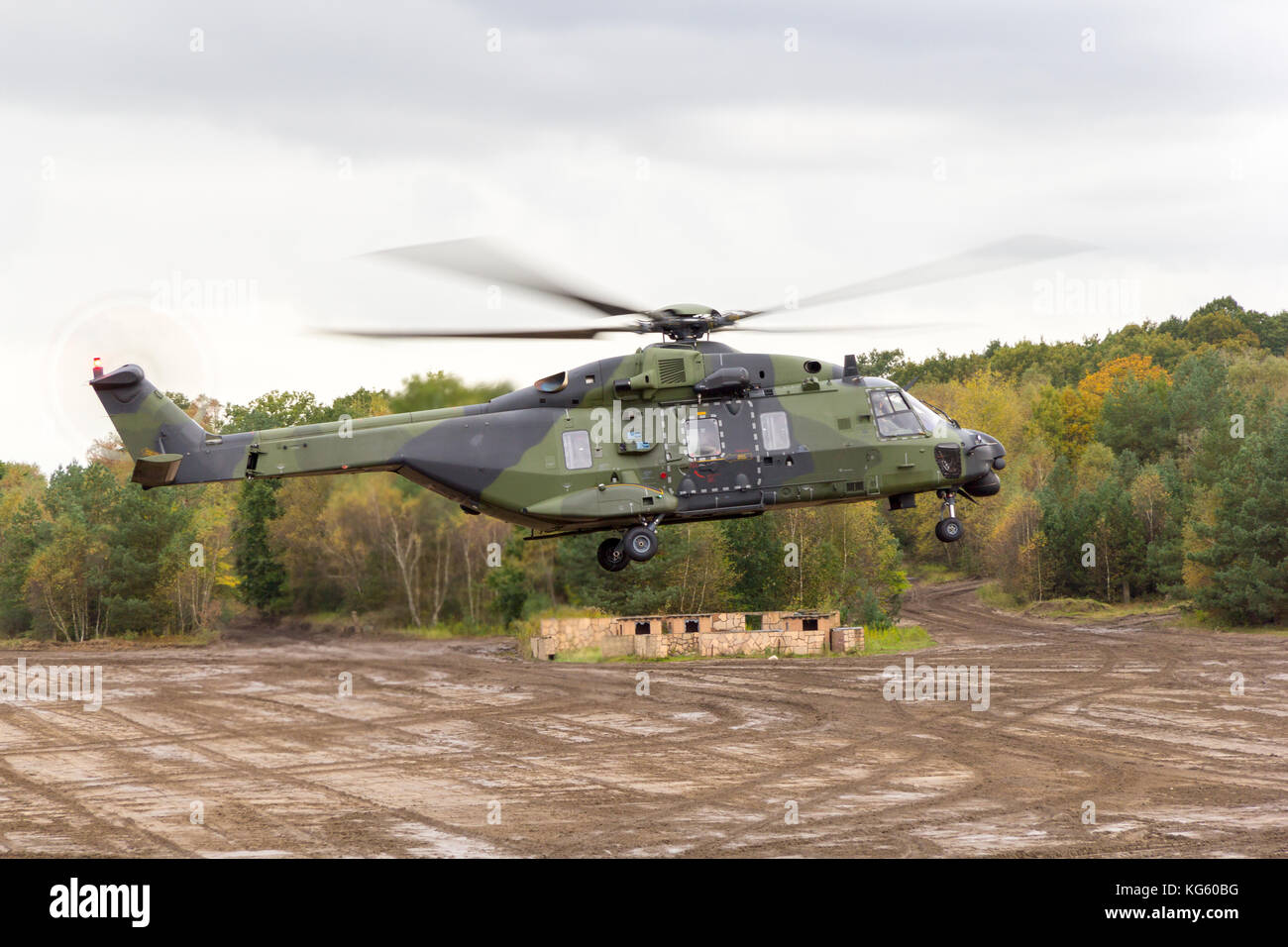 german military helicopter in flights over battlefield Stock Photo Alamy