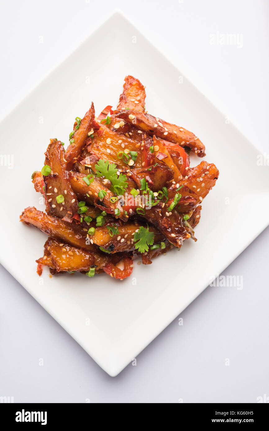 honey chilli potato or Potato wedges, popular IndianChinese starter