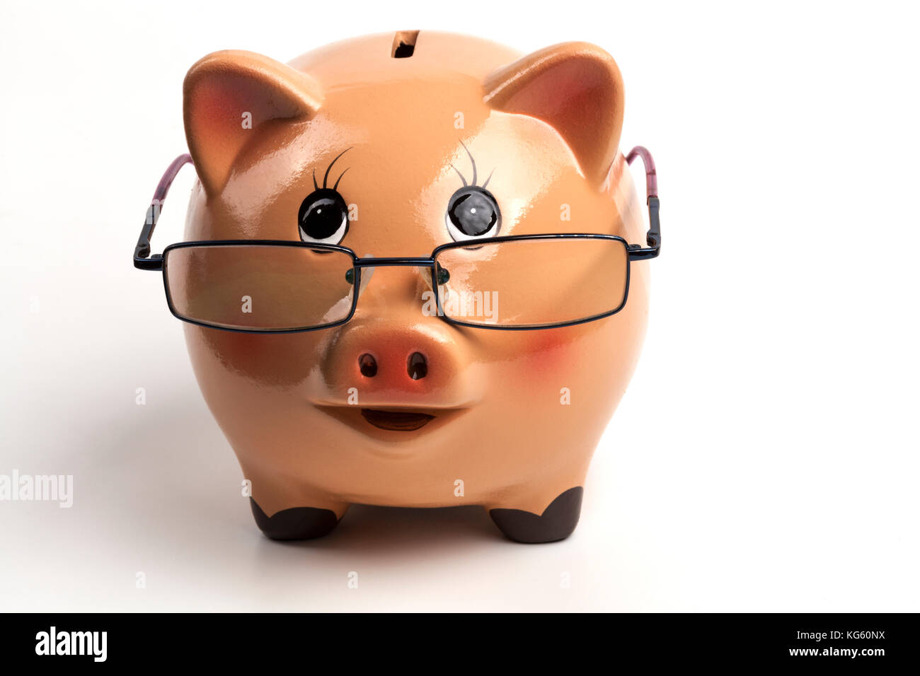 Piggy Bank With Glasses Isolated on White Background Stock Photo - Alamy