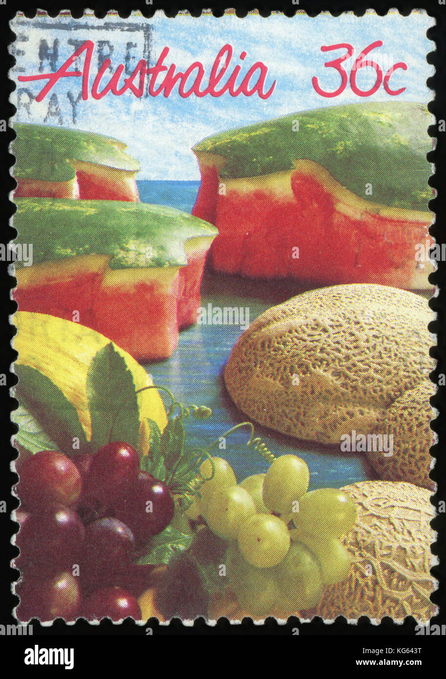 AUSTRALIA - CIRCA 1987: A stamp printed in Australia shows Grapes & Melons, Fruit series, 1987 Stock Photo