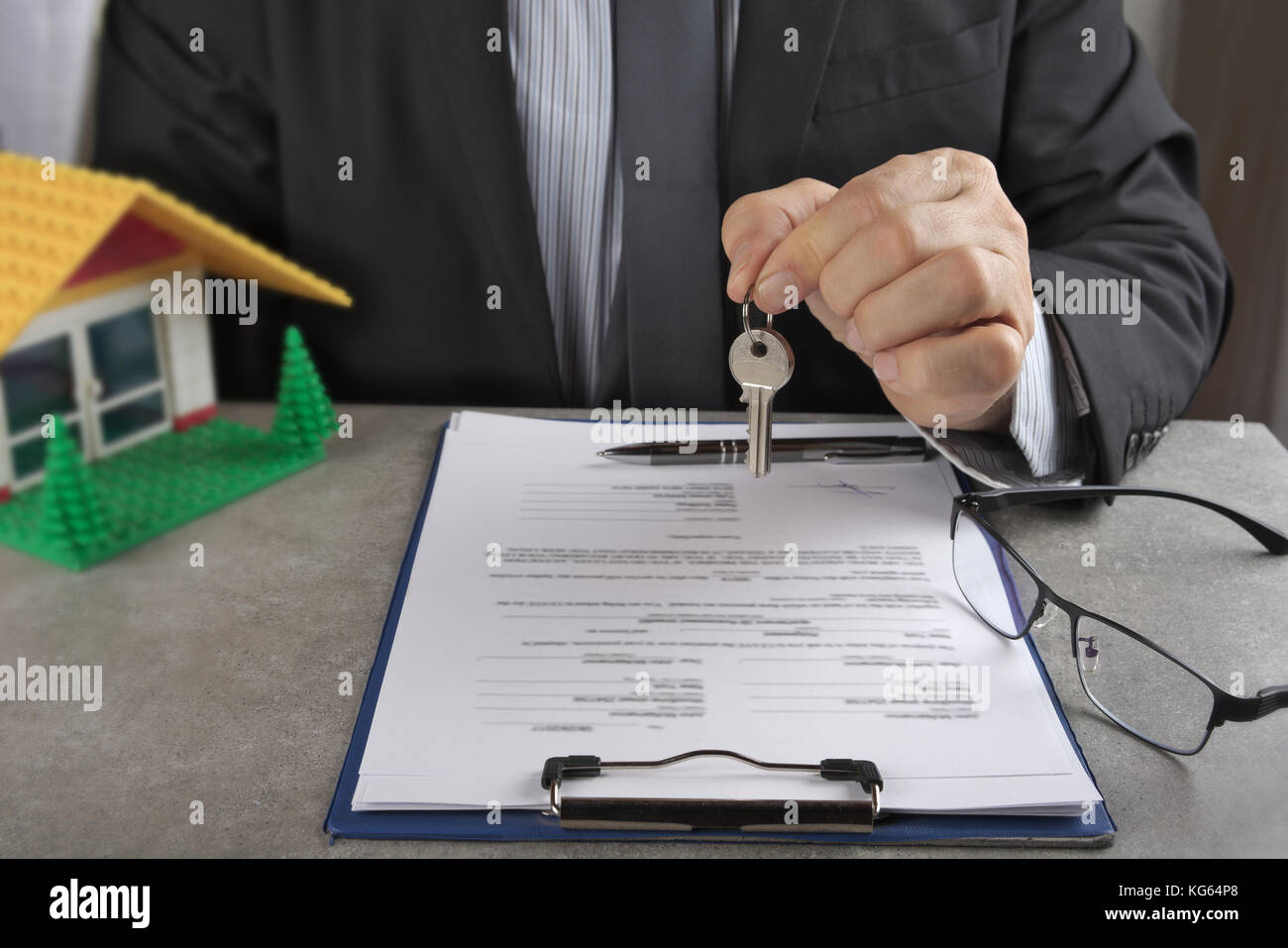 Signed house purchase agreement after the loan approval Stock Photo