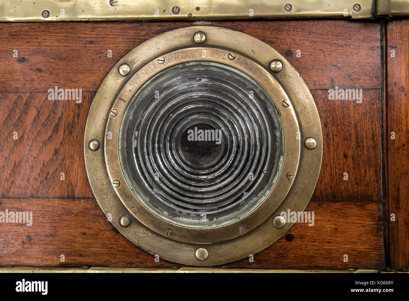 Porthole of a sailing ship with a wooden surround Stock Photo - Alamy