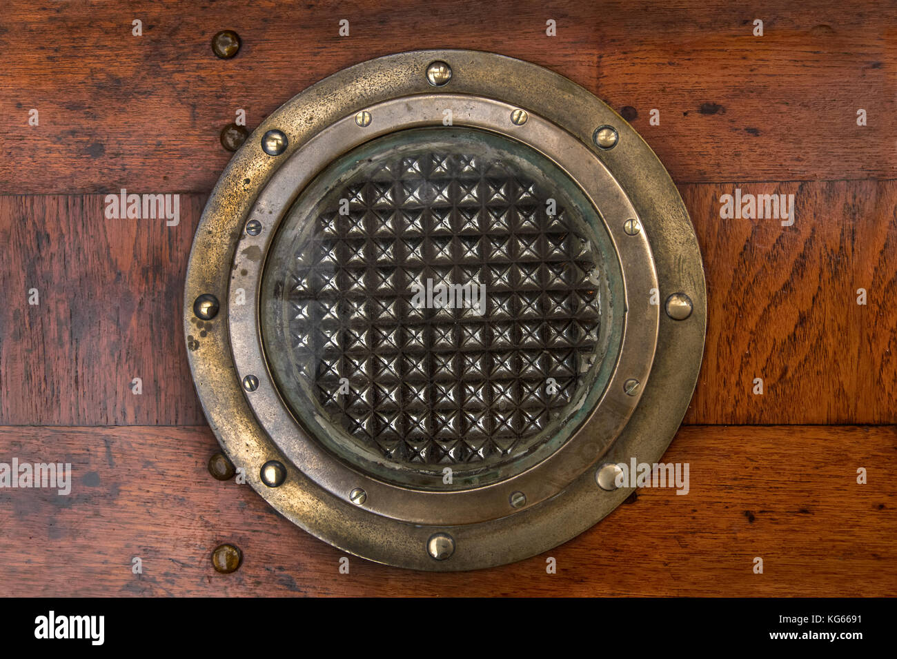 Porthole of a sailing ship with a wooden surround Stock Photo - Alamy