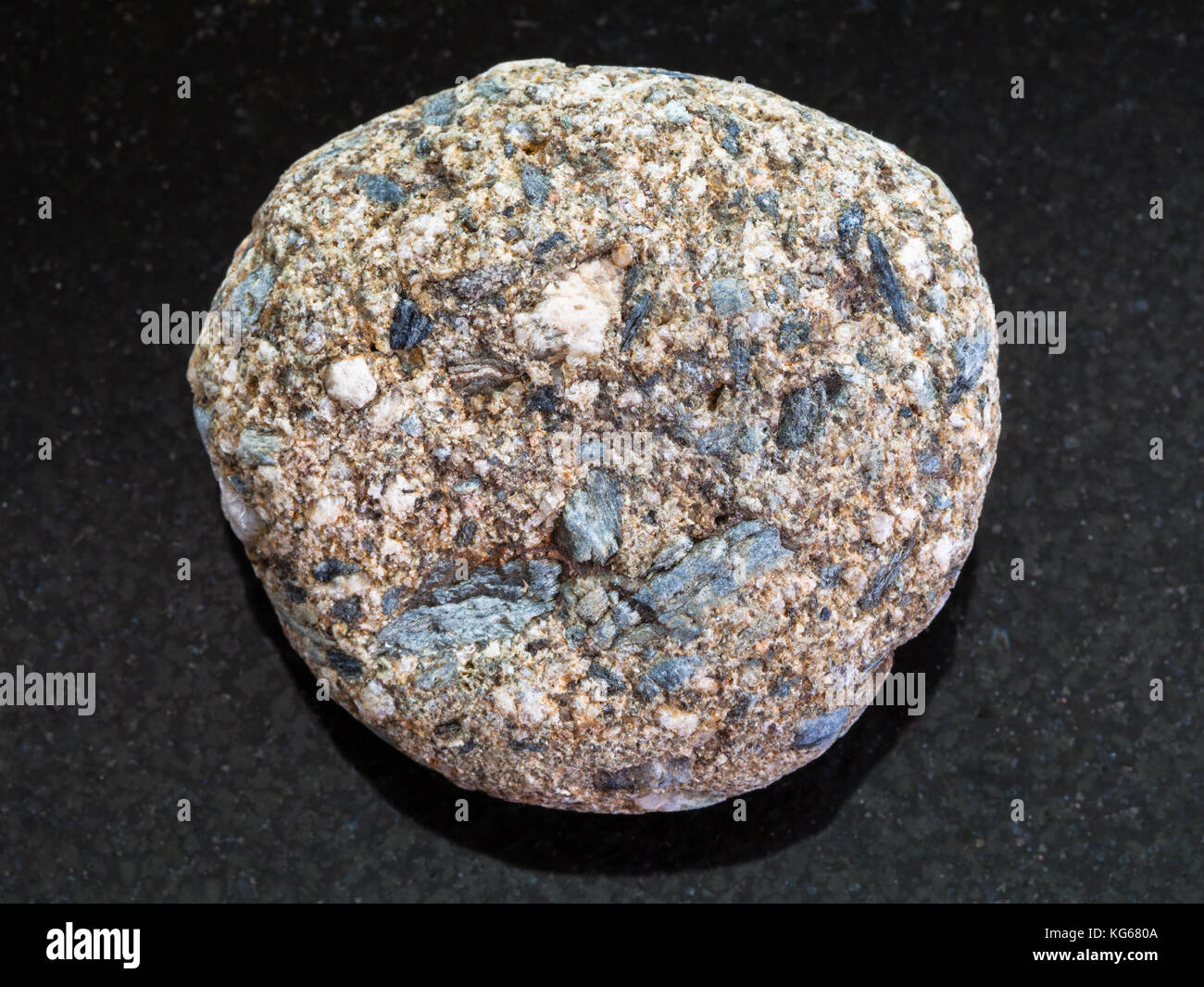 macro shooting of natural mineral rock specimen - tumbled Arkose ...