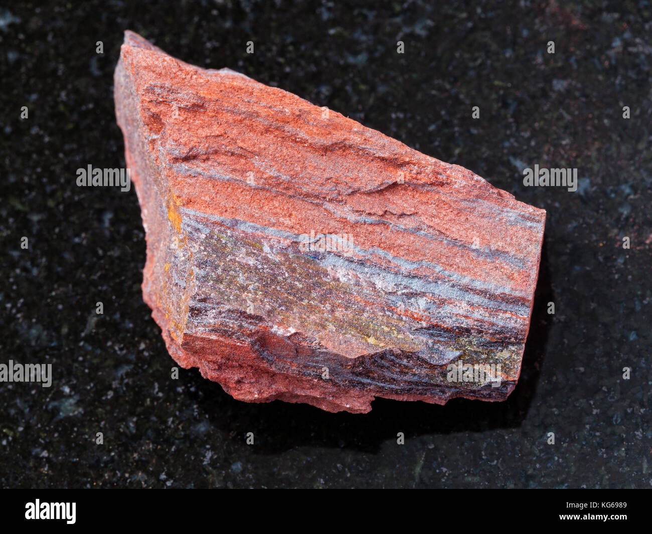 macro shooting of natural mineral rock specimen - rough ferruginous ...