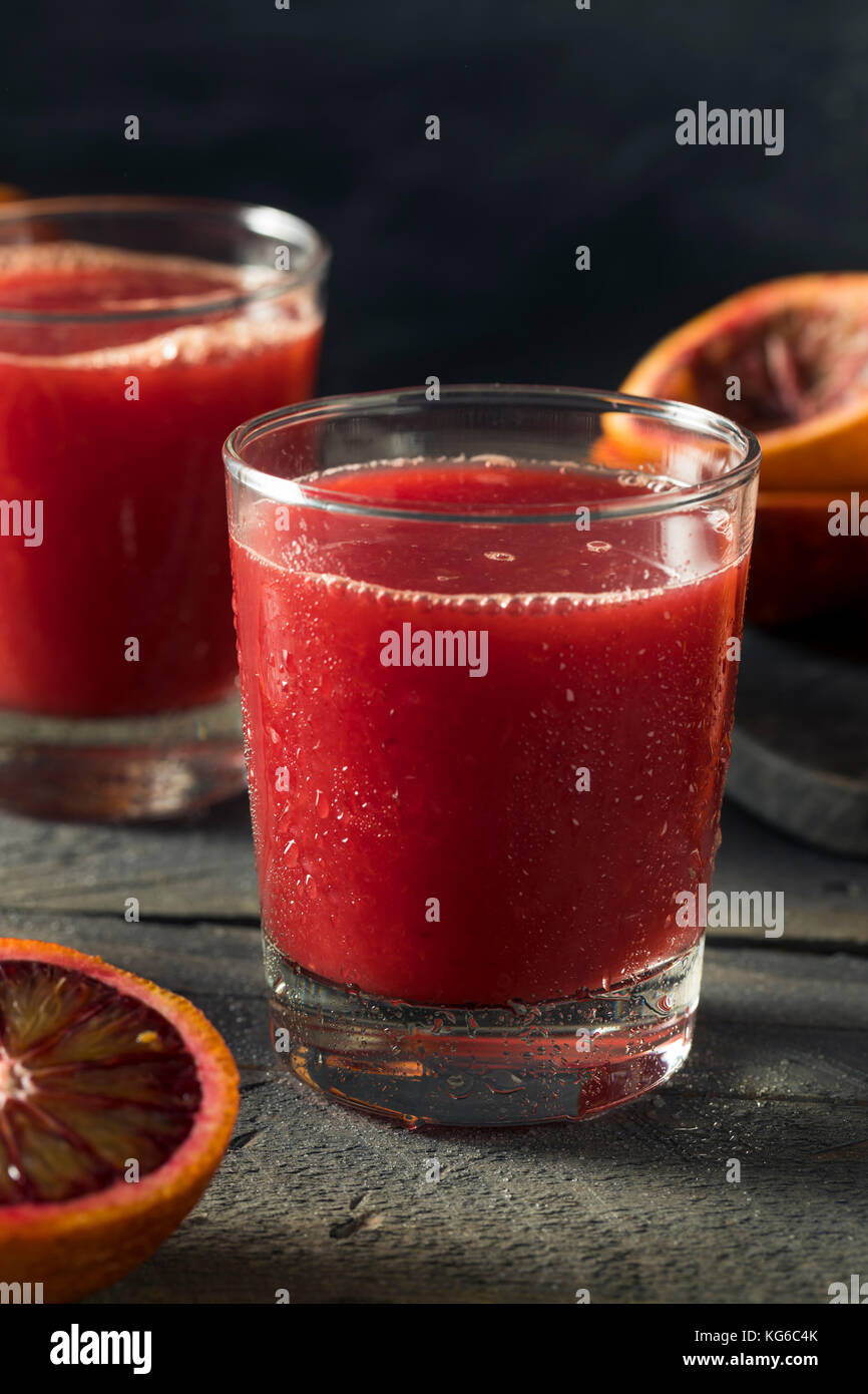 Raw Fresh Squeezed Blood Orange Juice Ready to Drink Stock Photo