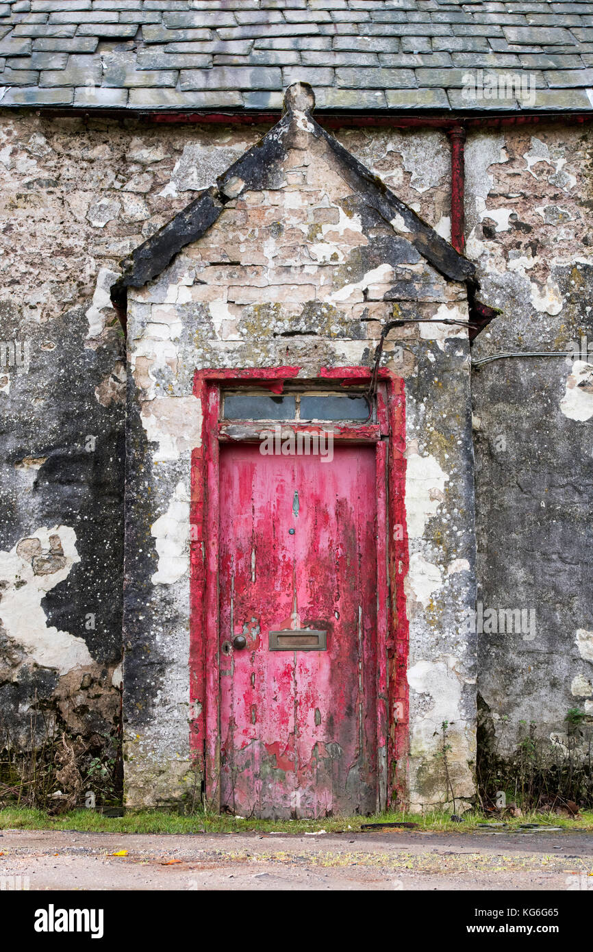 Old weathered scottish cottage front door in Wanlockhead, Dumfries and Galloway, Scottish borders, Scotland Stock Photo