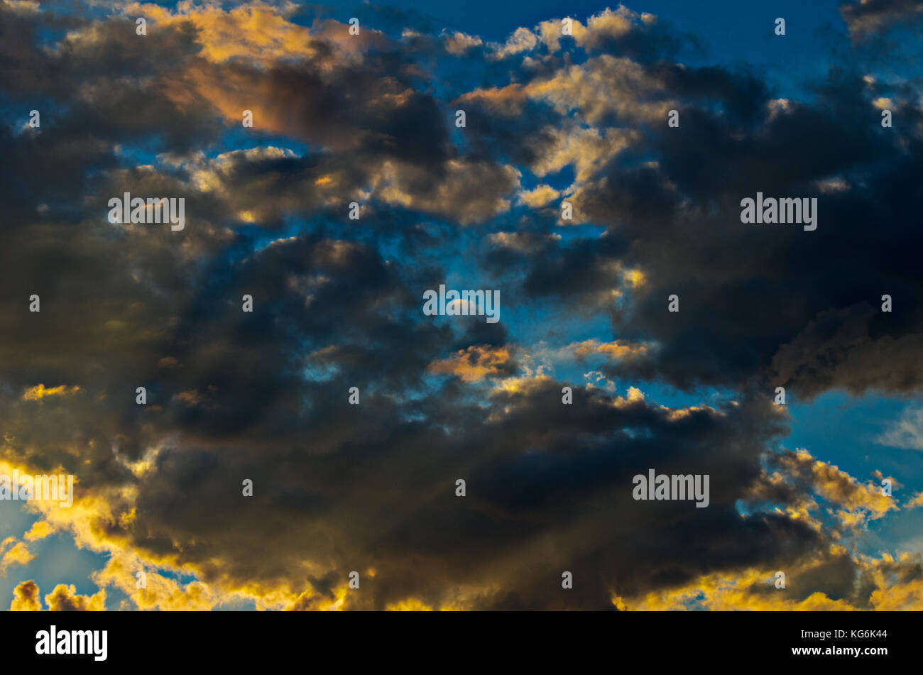 Dramatic sunset sky with colorful clouds after thunderstorm Stock Photo ...