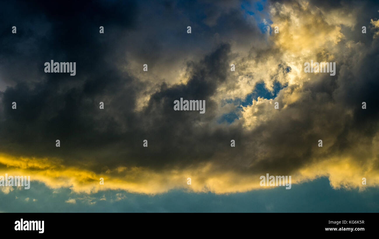 Dramatic sunset sky with colorful clouds after thunderstorm Stock Photo ...