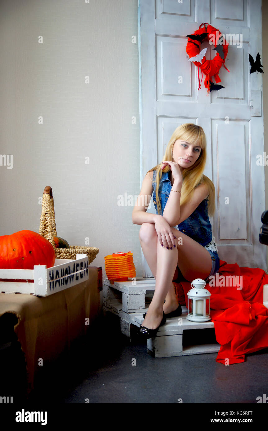 Lonely beautiful girl posing in studio.Indoor portrait Stock Photo