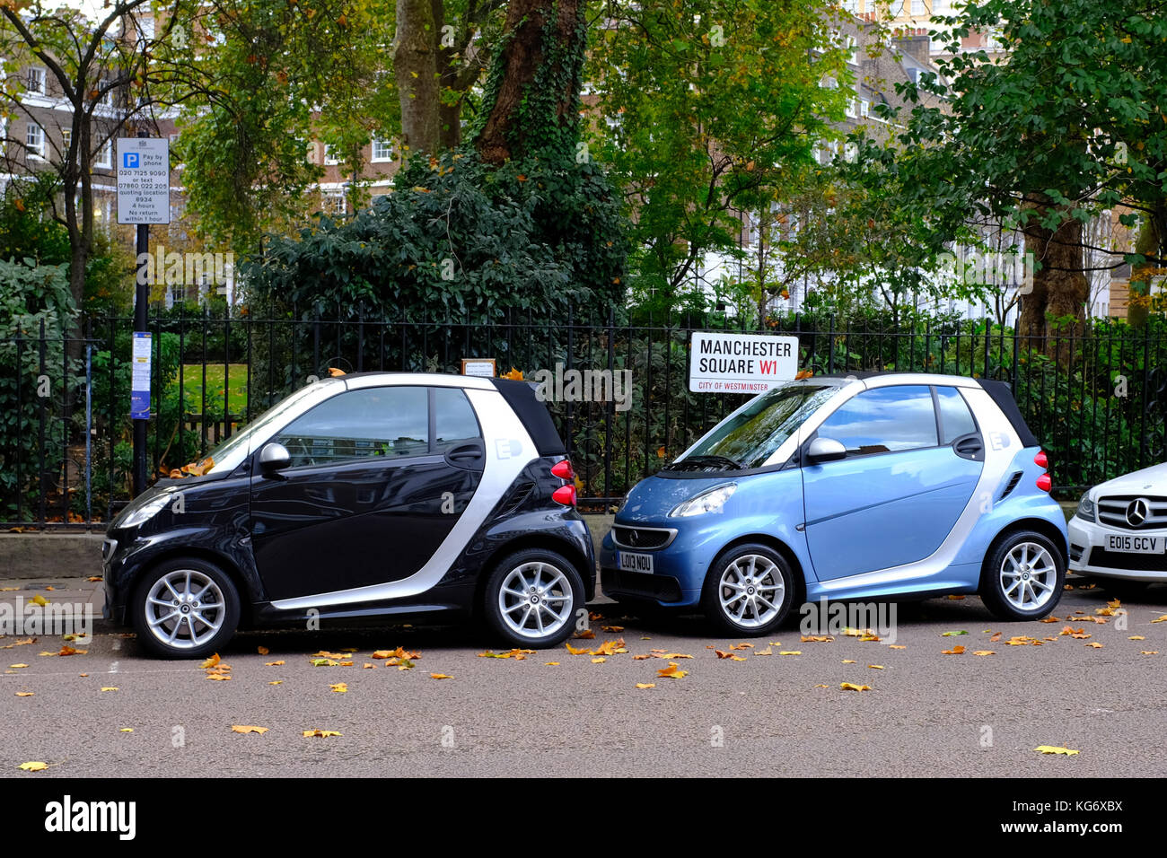 Smart Cars parked in Manchester Square London UK Stock Photo