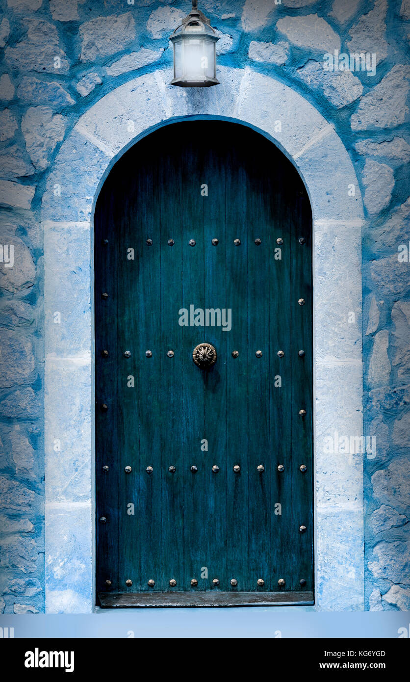 Old Blue door with arch background Stock Photo - Alamy