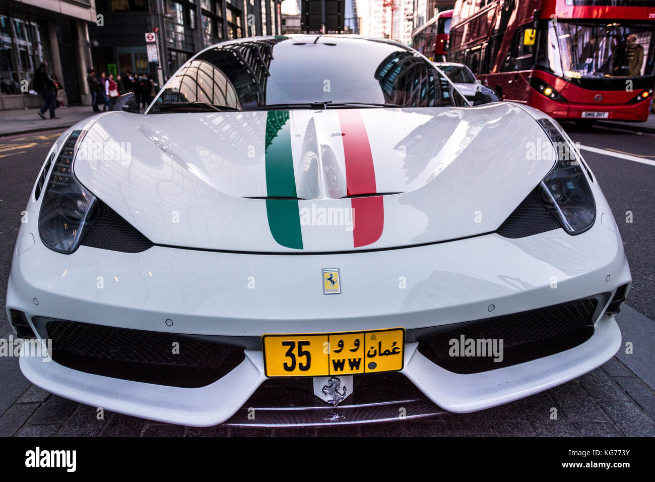 An Omani registered Ferrari sports car parked in Bishopsgate, London, England, UK Stock Photo