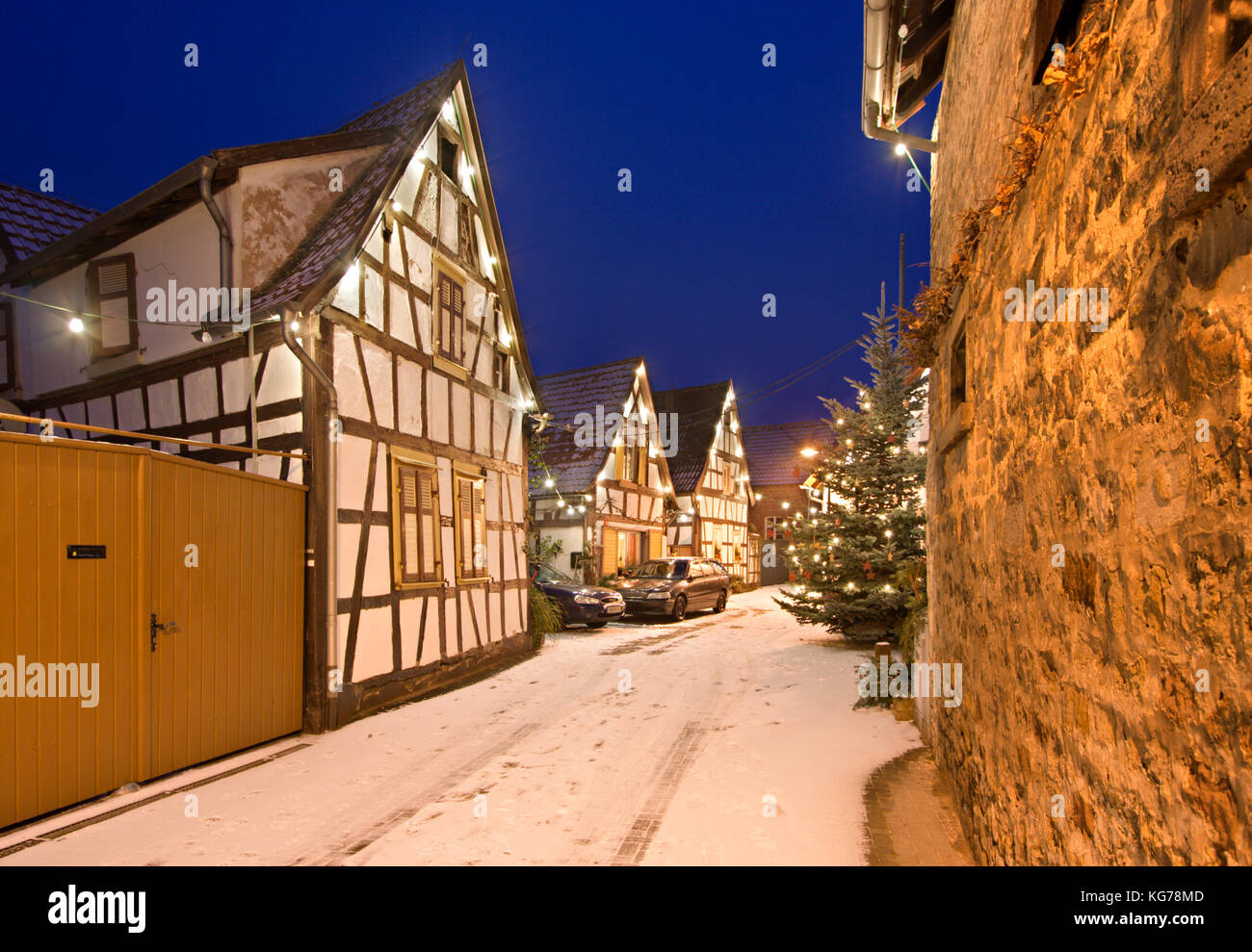 A christmassy decorated street in a small german village in Lachen, Neustadt an der Weinstrasse, Germany. Stock Photo