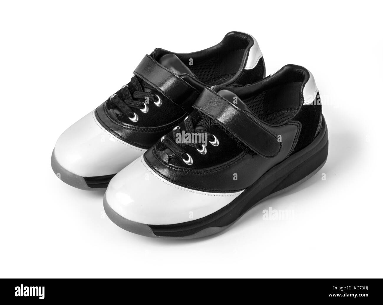Two-tone black and white  leather  shoes on white with clipping path Stock Photo
