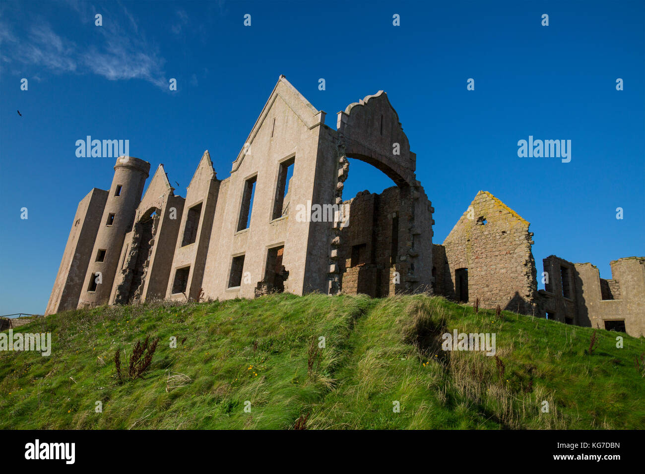 The cliff top ruins of Slains Castle on the North Sea coast in Aberdeenshire, Scotland - allegedly the inspiration for Bram Stoker's novel 'Dracula'. Stock Photo