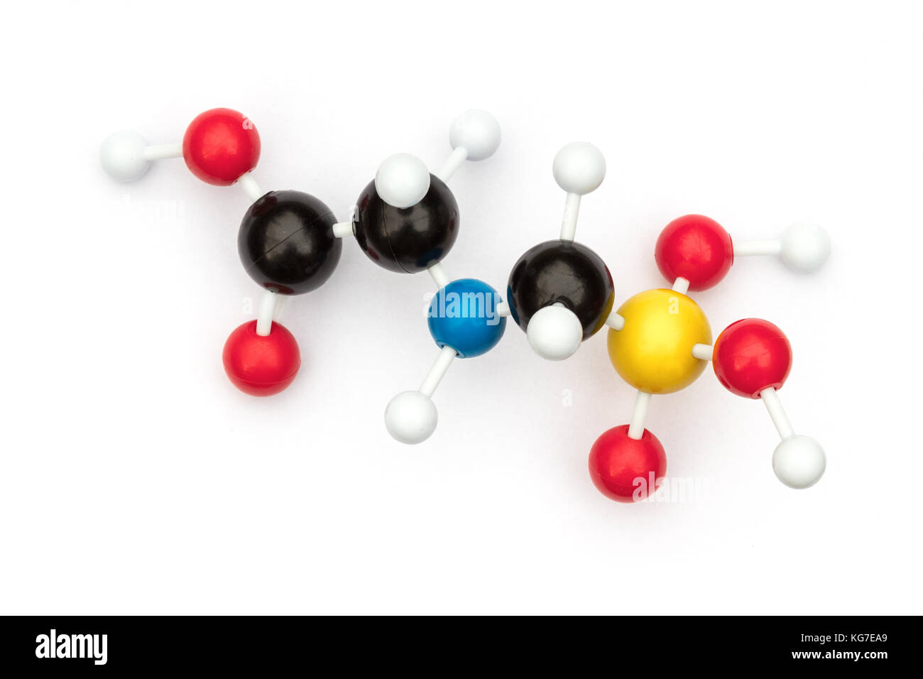Plastic ball-and-stick model of the systemic herbicide glyphosate (chemical formula: C3H8NO5P) on a white background. Stock Photo