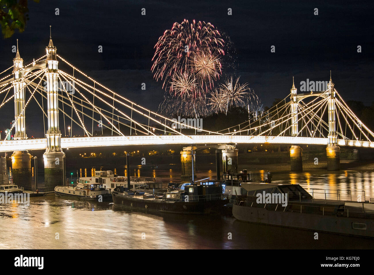 The Battersea Park fireworks over Albert Bridge, in London. Stock Photo