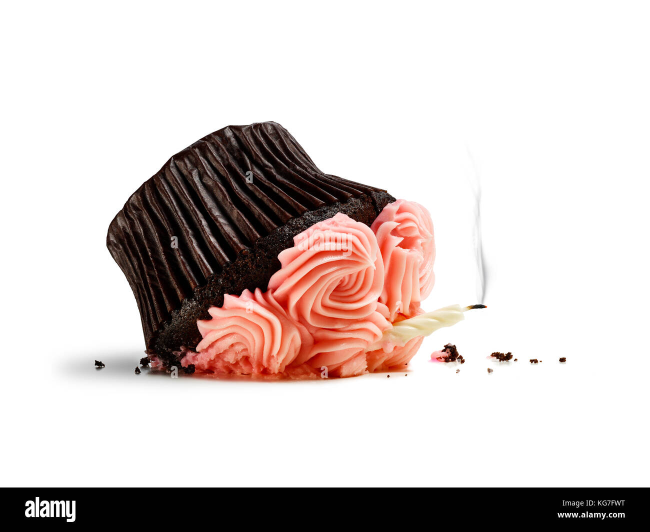 Dropped cupcake with candle and smoke isolated on white Stock Photo Alamy