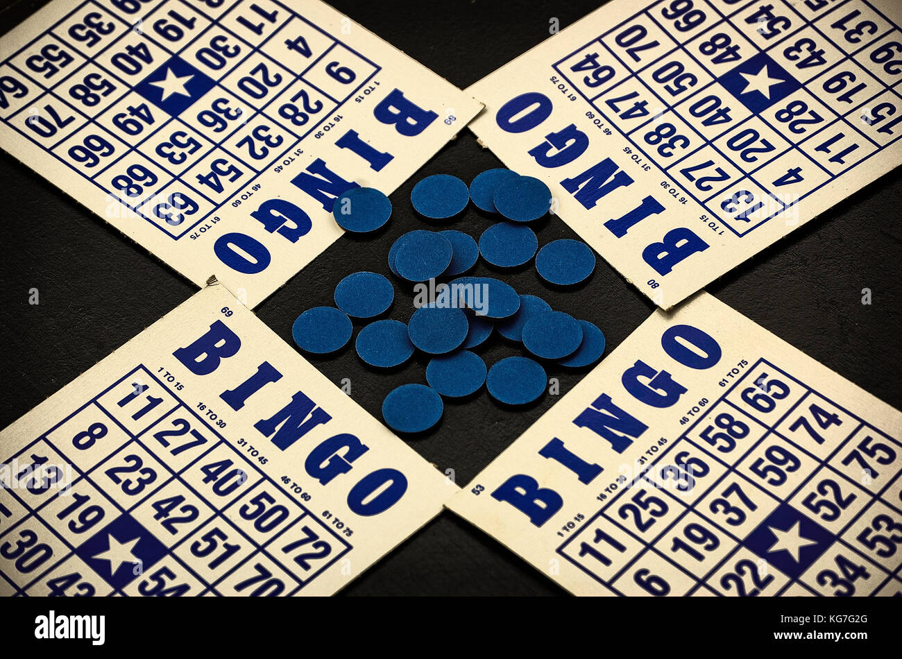 Bingo card and markers, blue and white Stock Photo Alamy