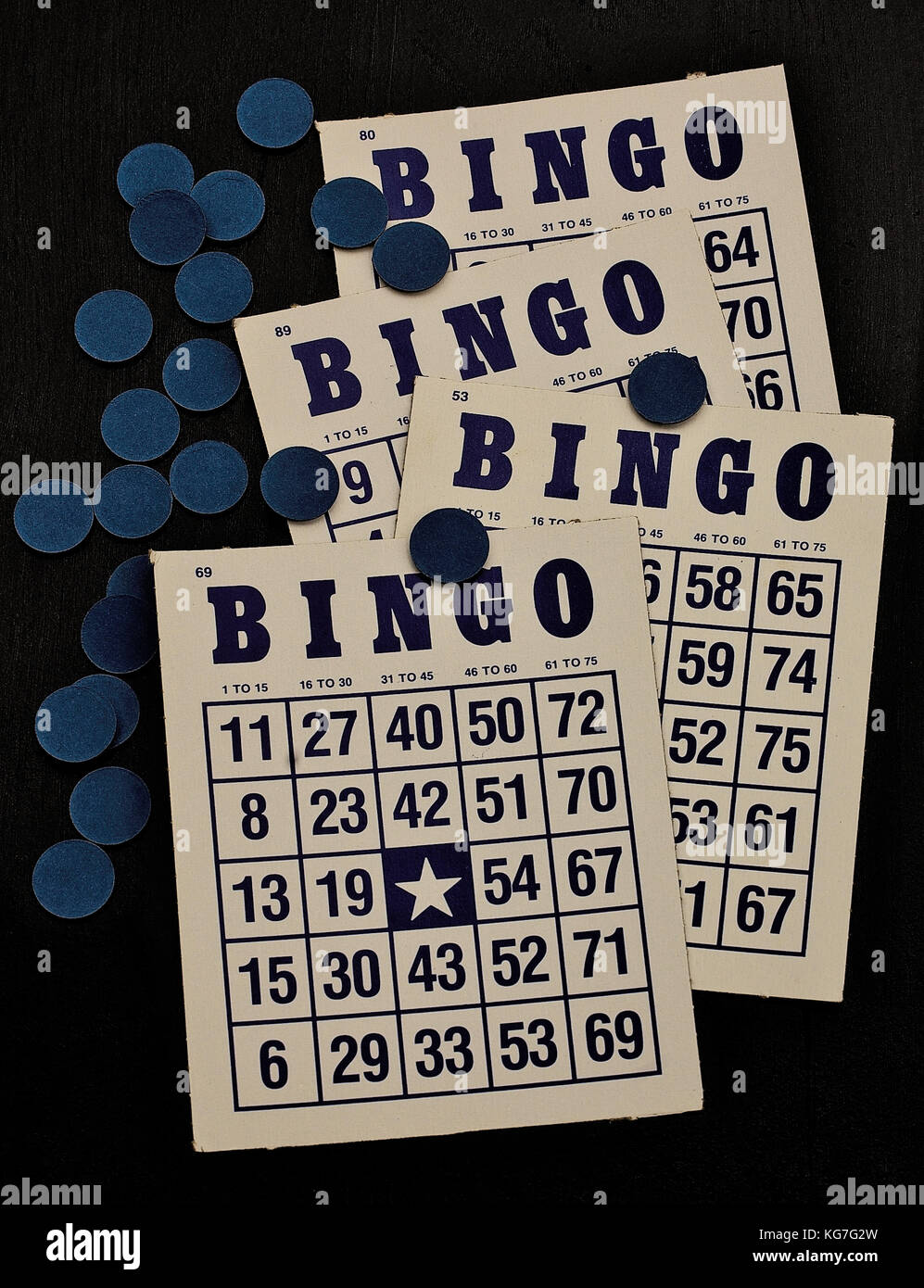 Bingo card and markers, blue and white Stock Photo Alamy