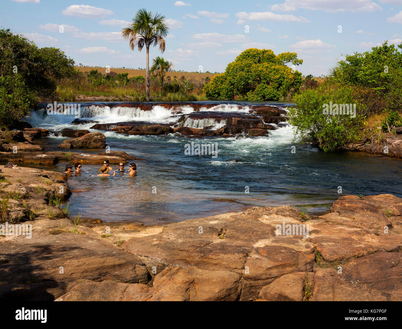 Tourists bathing at Balsas River near Fumaça waterfall, Tocantins estate, Brazil Stock Photo
