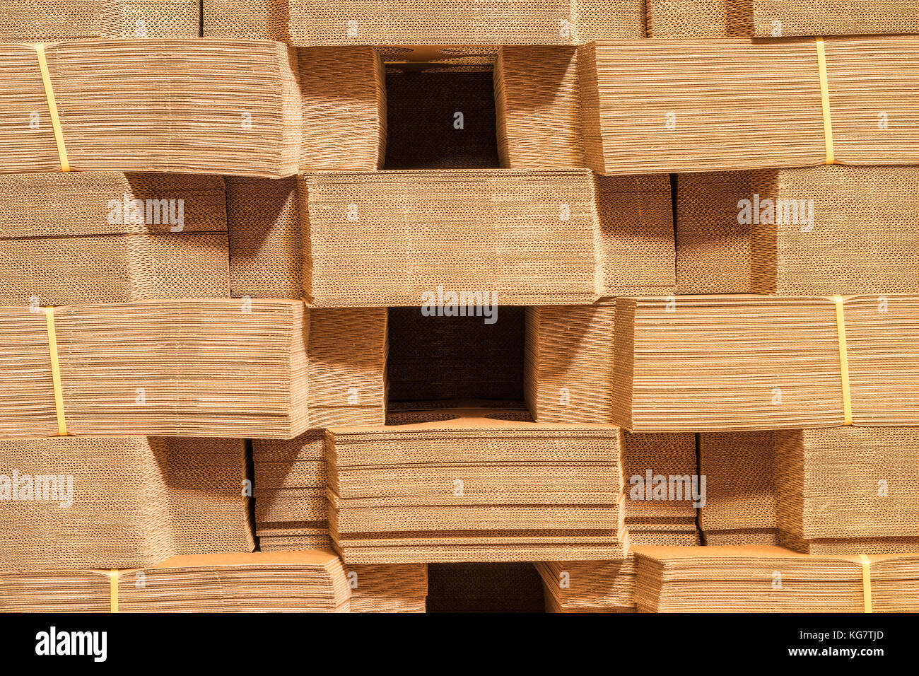 Cardboard inserts folded and stack ready to be used Stock Photo Alamy