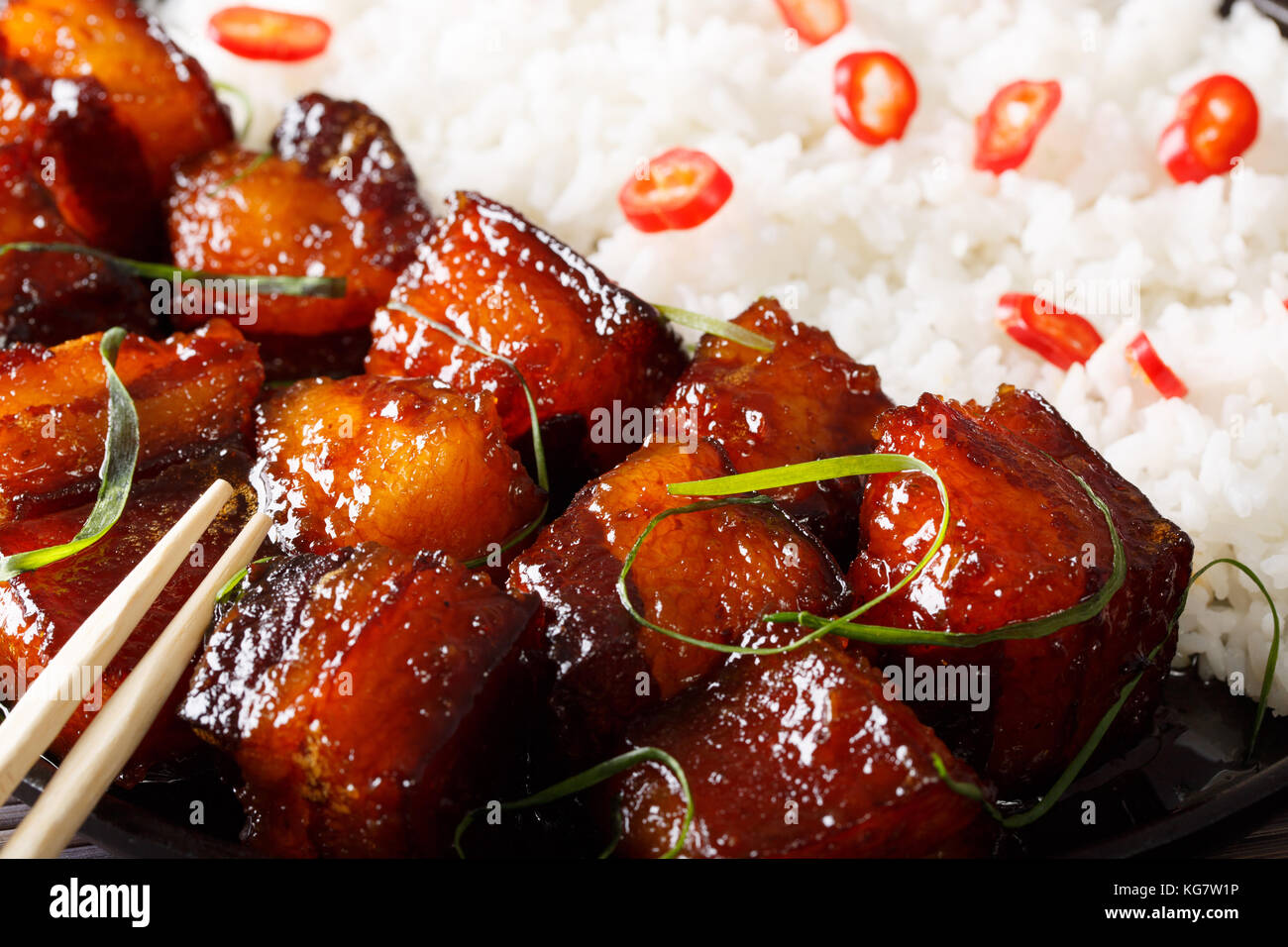 Vietnamese food caramelized pork belly with rice macro. horizontal