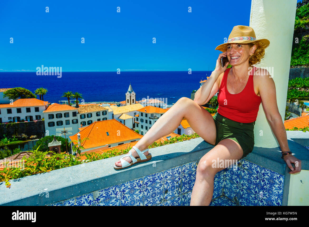 Woman in a balcony. Stock Photo