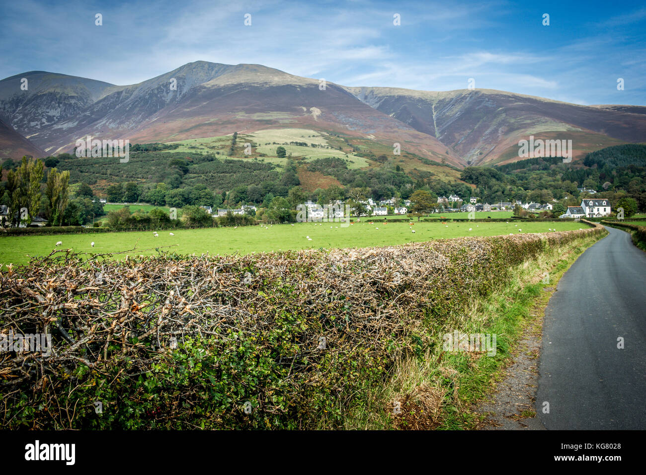 Road leading to a small village outside Coniston in the Lake District National Park Stock Photo