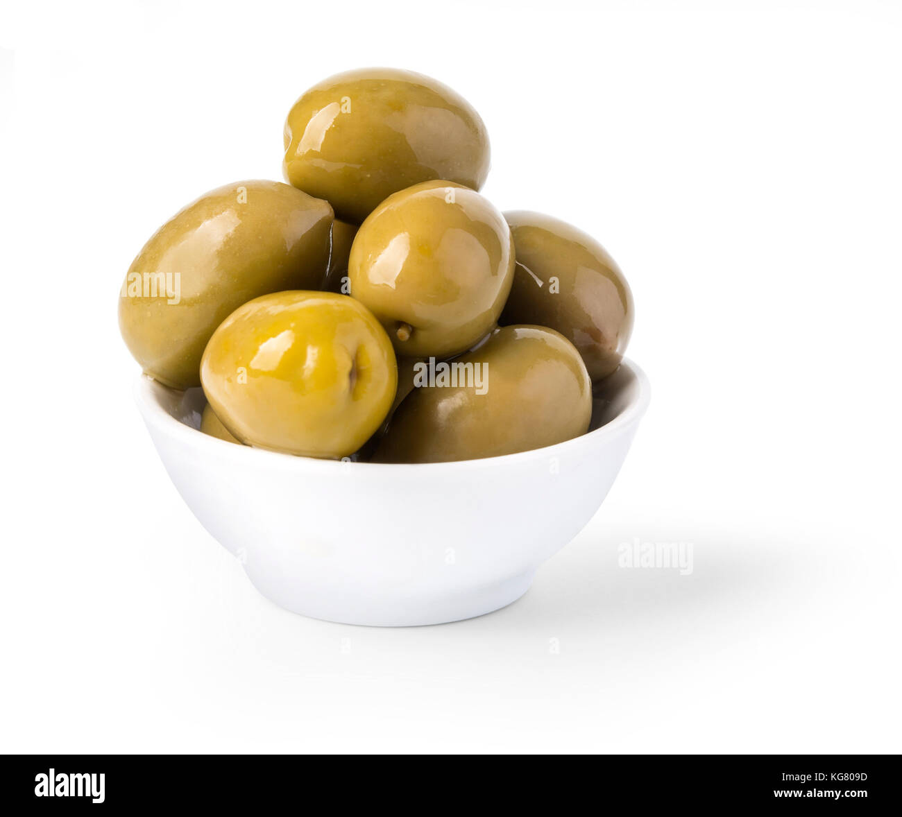 Bowl of brine cured green olives isolated on white with clipping path