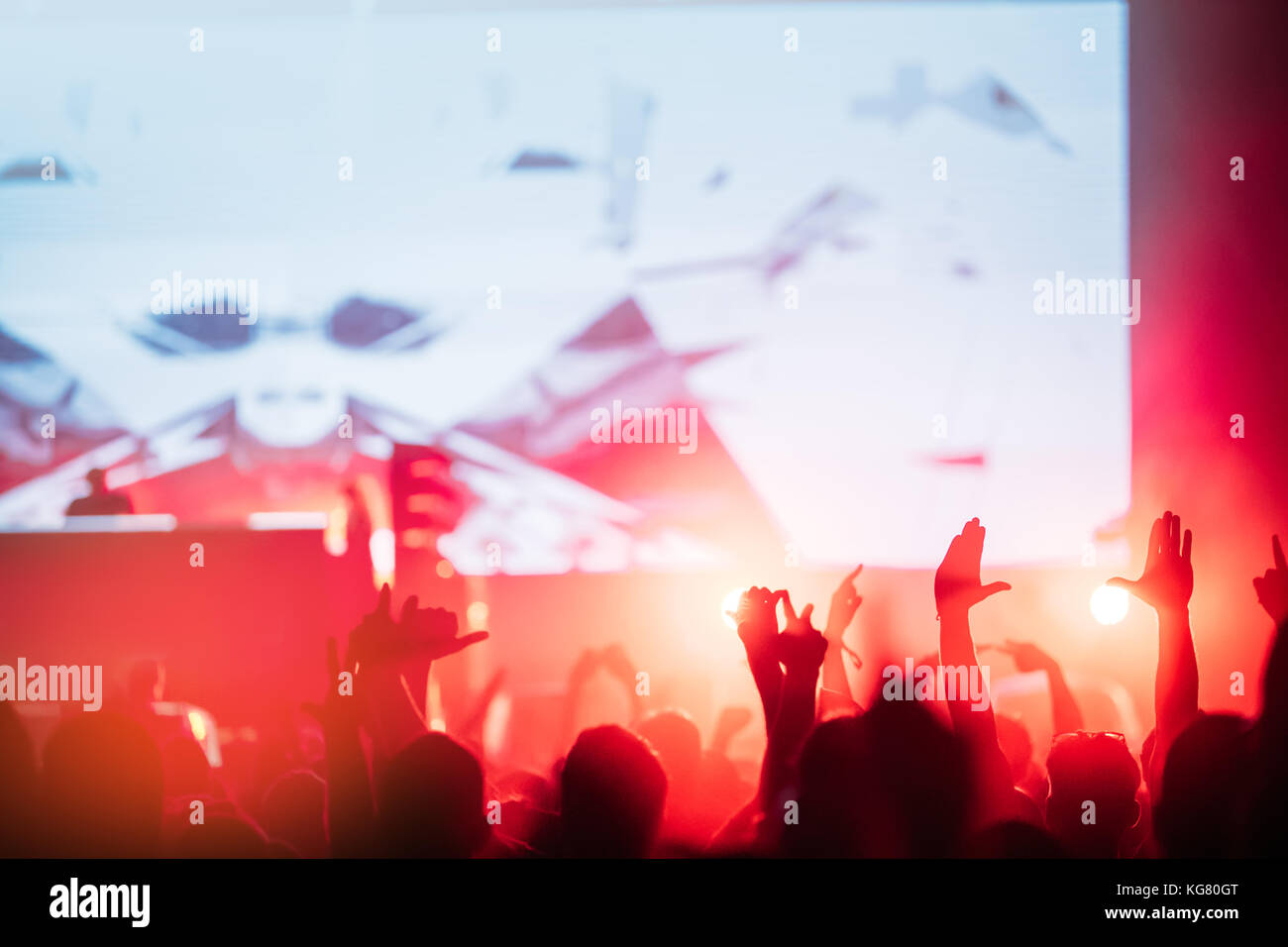 Cheering crowd with hands in air at music festival Stock Photo - Alamy
