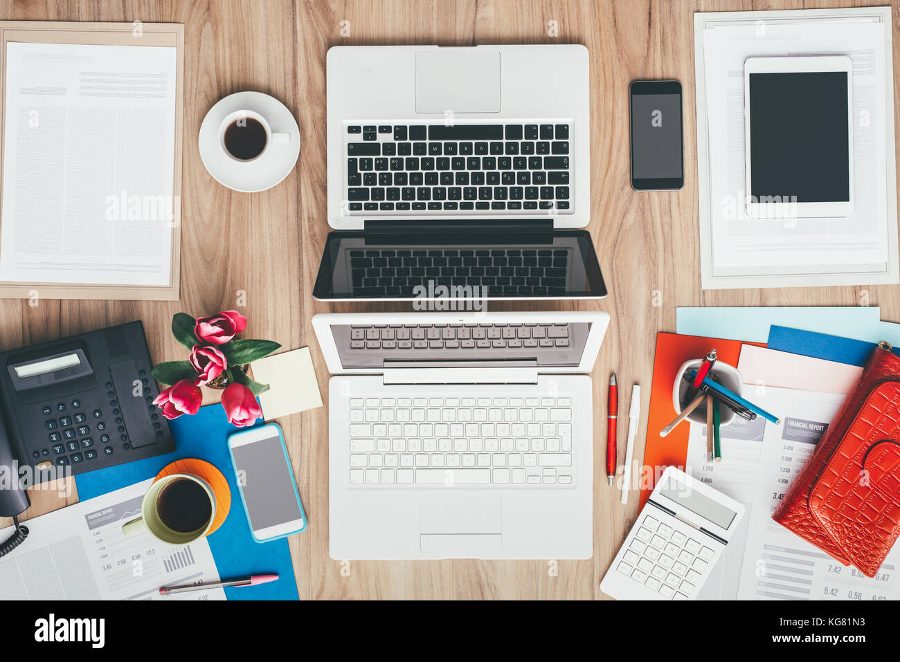 Feminine creative messy desktop facing a male simple and standard