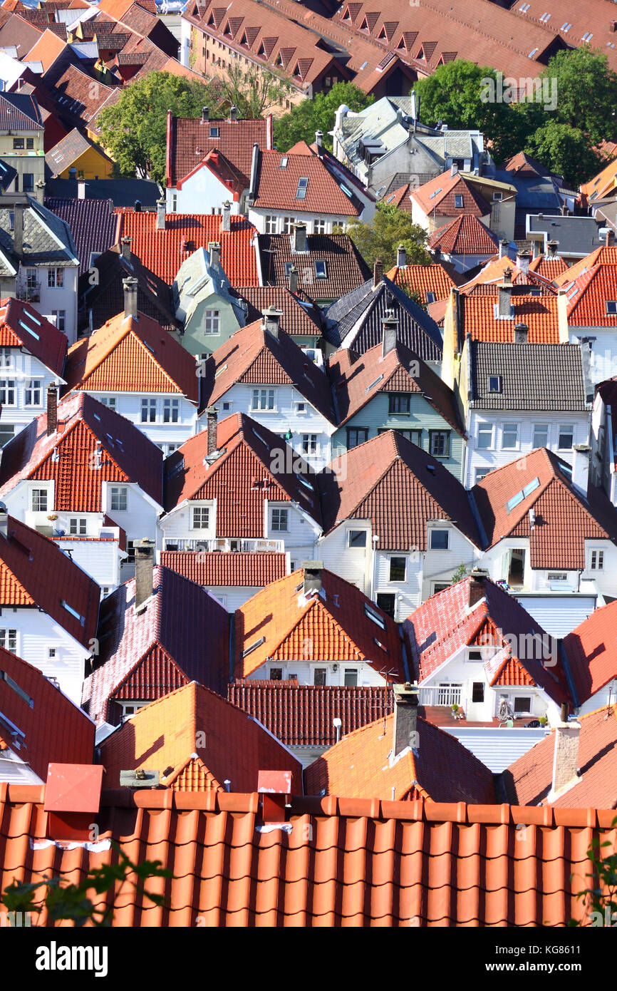 Pretty terracota rooftops of houses in the Bergenhus district of Bergen ...
