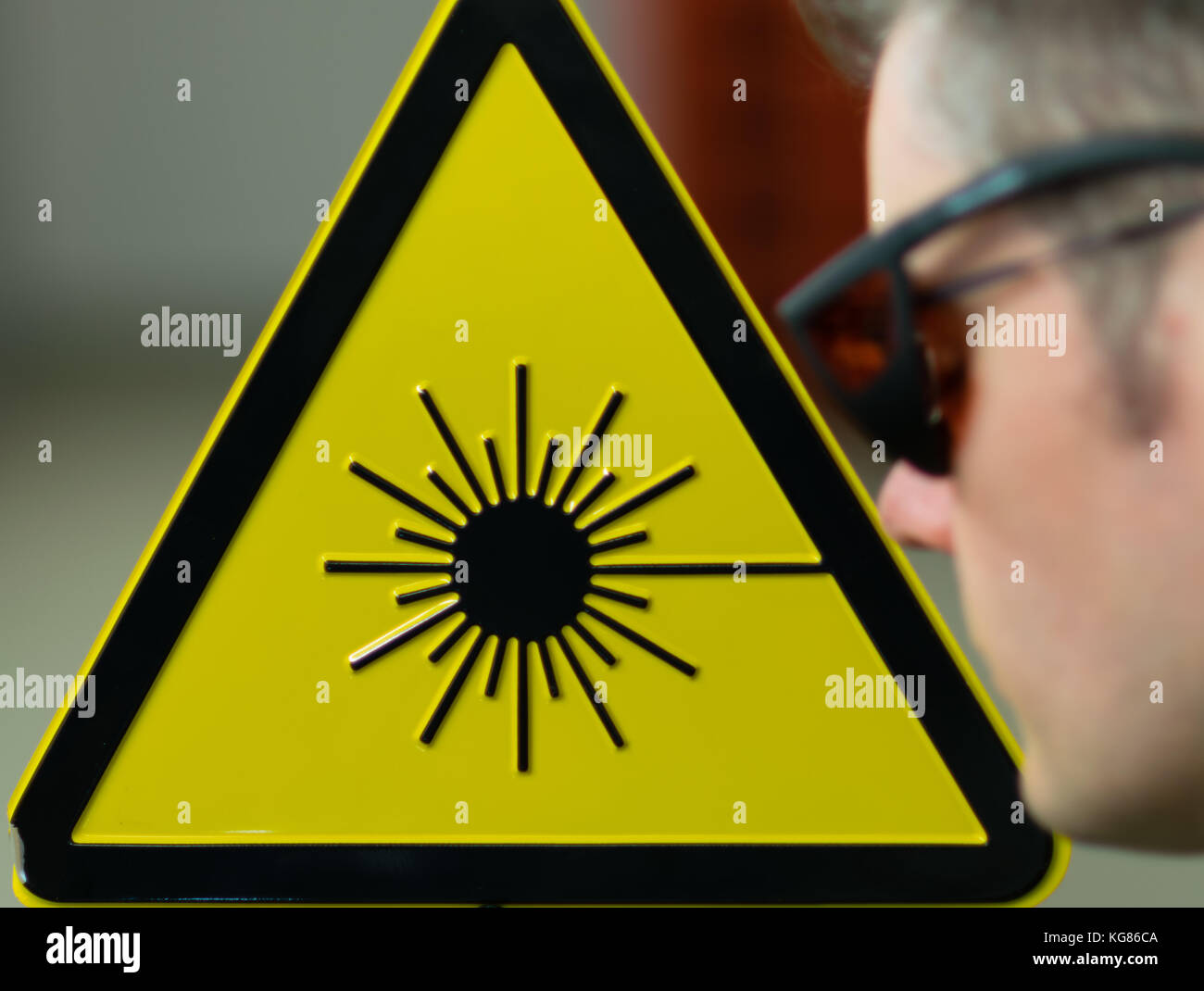 Laser safety sign and laser safety googles Stock Photo