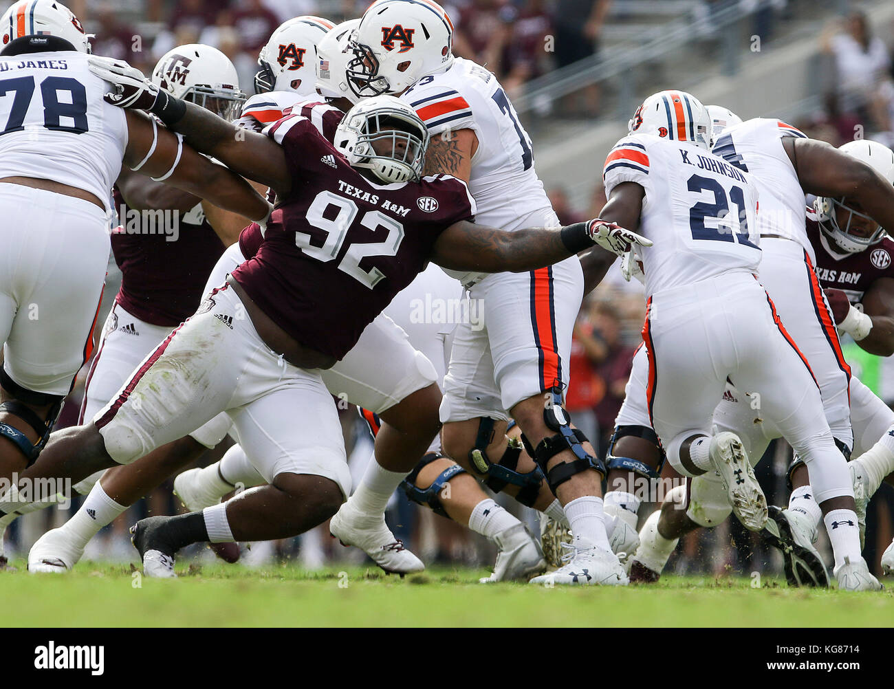 November 4, 2017: Texas A&M Aggies defensive lineman Zaycoven Henderson (92) reaches for Auburn Tigers running back Kerryon Johnson (21) in the first quarter during the NCAA football game between the Auburn Tigers and the Texas A&M Aggies at Kyle Field in College Station, TX; John Glaser/CSM. Stock Photo
