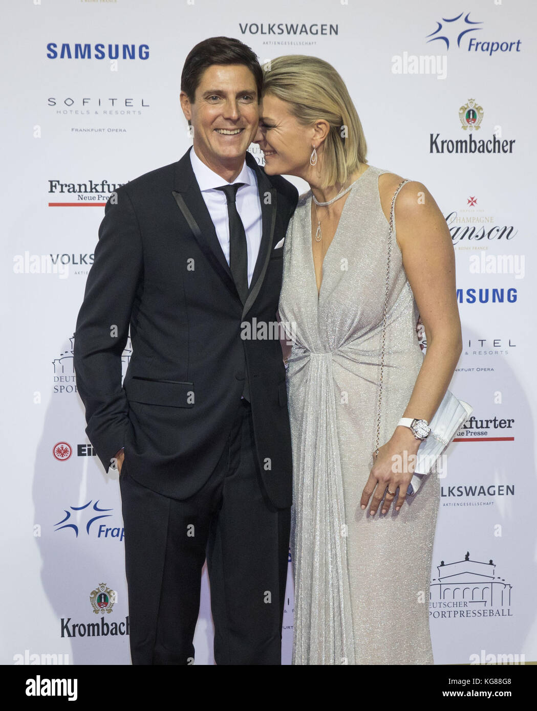 Former Ski Racer Maria Hoefl-Riesch (r) And Her Husband Marcus Hoefl (l