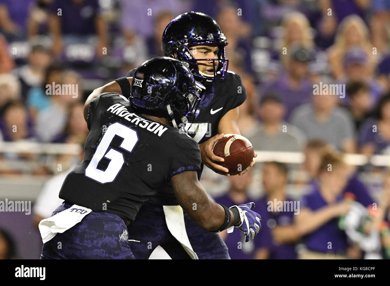 Ft. 4th Nov, 2017. TCU Horned Frogs quarterback Kenny Hill (7) hands the ball off during an NCAA football game between the Texas Longhorns and the TCU Horned Frogs at Amon G. Carter Stadium in Ft. Worth, Texas. Shane Roper/CSM/Alamy Live News Stock Photo