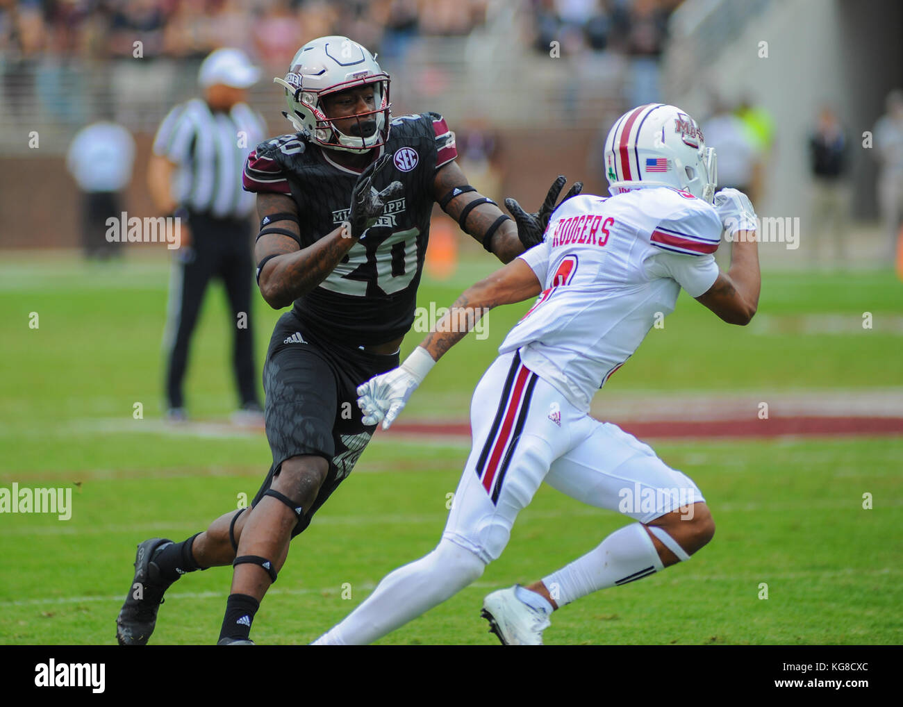 Starkville MS, USA. 14th Oct, 2017. TN, USA; MSU lineman, REGGIE TODD (20), and UMass CB, ISAIAH RODGERS (9), in NCAA D1 action in Starkville MS. The Bulldogs defeated the UMass Minuteman 34-23. Kevin Langley/CSM/Alamy Live News Stock Photo