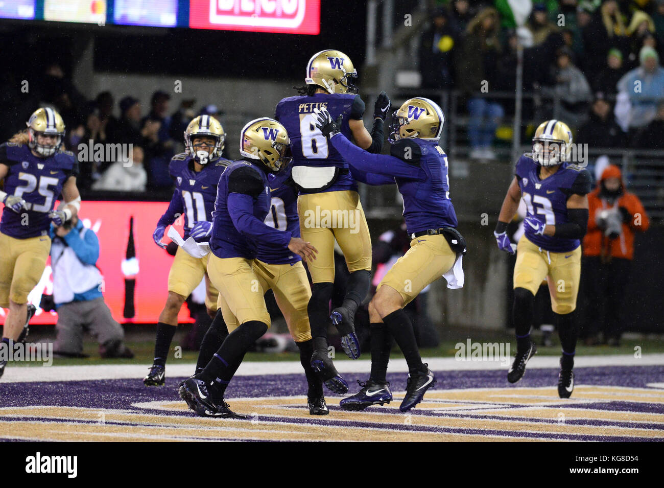 Seattle, WA, USA. 4th Nov, 2017. The UW punt return team celebrates a 64 yard punt return by Dante Pettis (8) in a PAC12 football game between the Oregon Ducks and the Washington Huskies. The game was played at Husky Stadium on the University of Washington campus in Seattle, WA. Jeff Halstead/CSM/Alamy Live News Stock Photo
