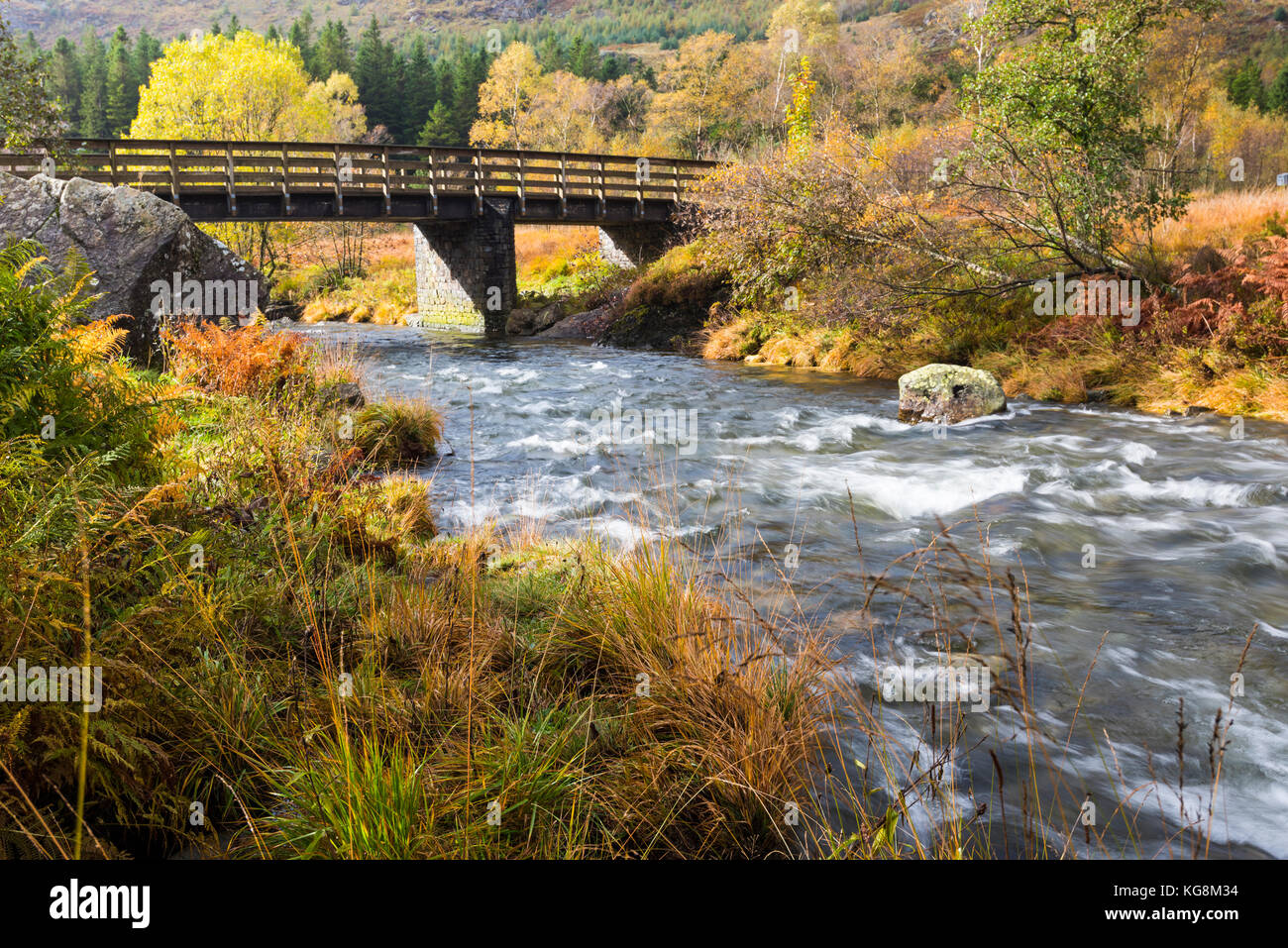 River flowing under bridge into Derwentwater in the Lake District National Park, Cumbria