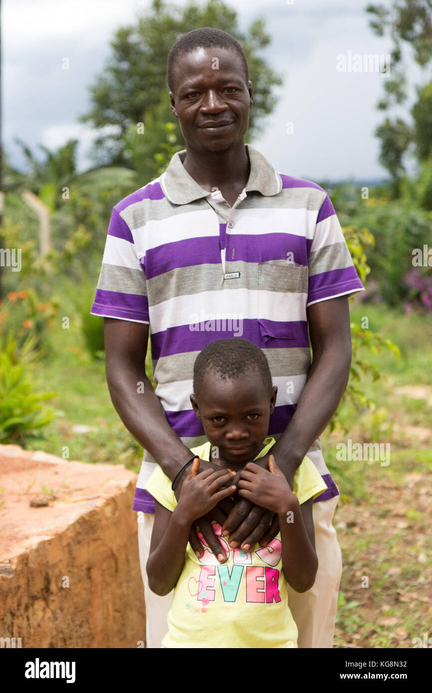 A Ugandan family comprising a mother and a father and two daughters Stock Photo