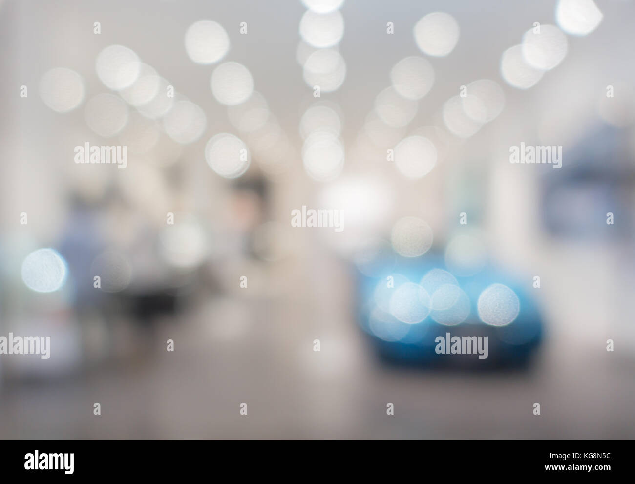 defocused image of Commercial car stand in show room Stock Photo
