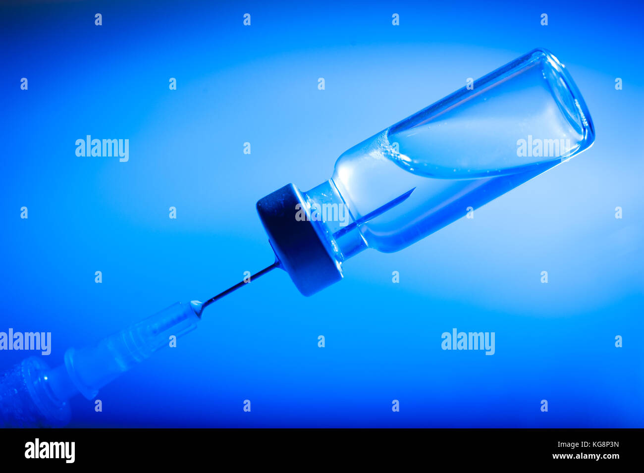 Preparation for vaccination, syringe filled with vaccine Stock Photo