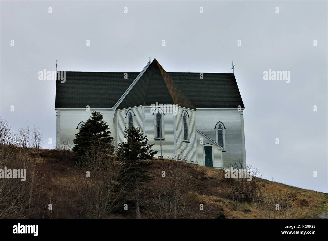 Back of St. George's Heritage Church, as seen from the beach, Brigus, Newfoundland and Labrador, Canada. Stock Photo