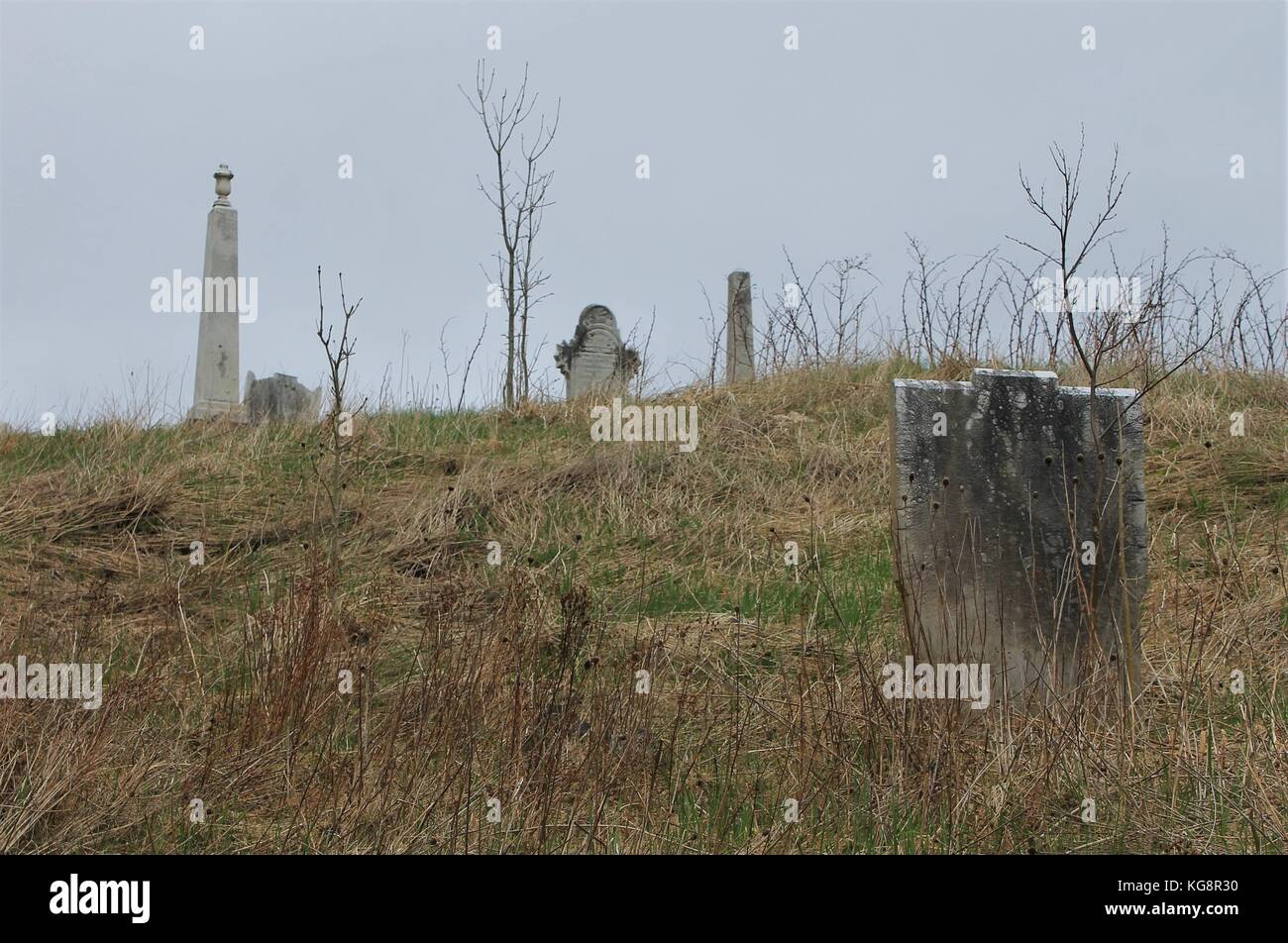 Old headstones in the old St. George's Cemetery, adjacent to St. George's Heritage Church, Brigus, Newfoundland and Labrador, Canada. Stock Photo