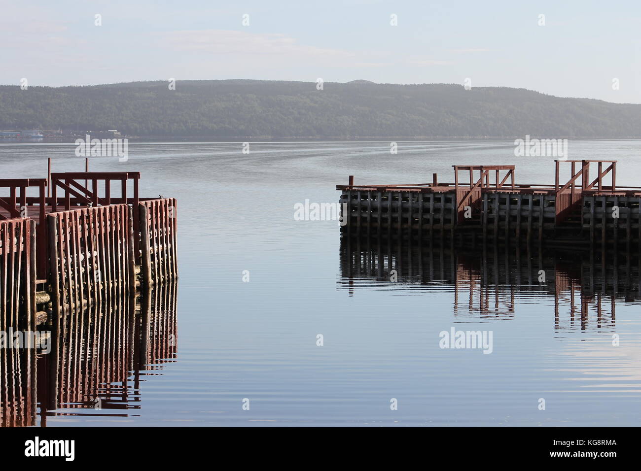 Looking across the bay from the pier and breakwater, early morning, Eastport, Newfoundland Labrador, Canada Stock Photo