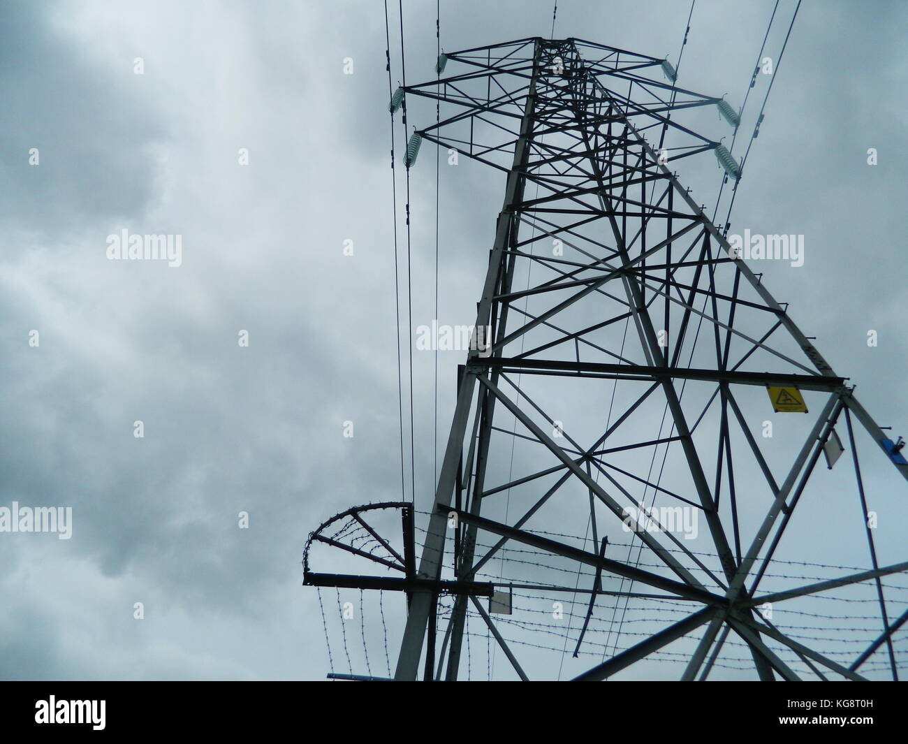 A close up shot looking up at electric wires. Stock Photo