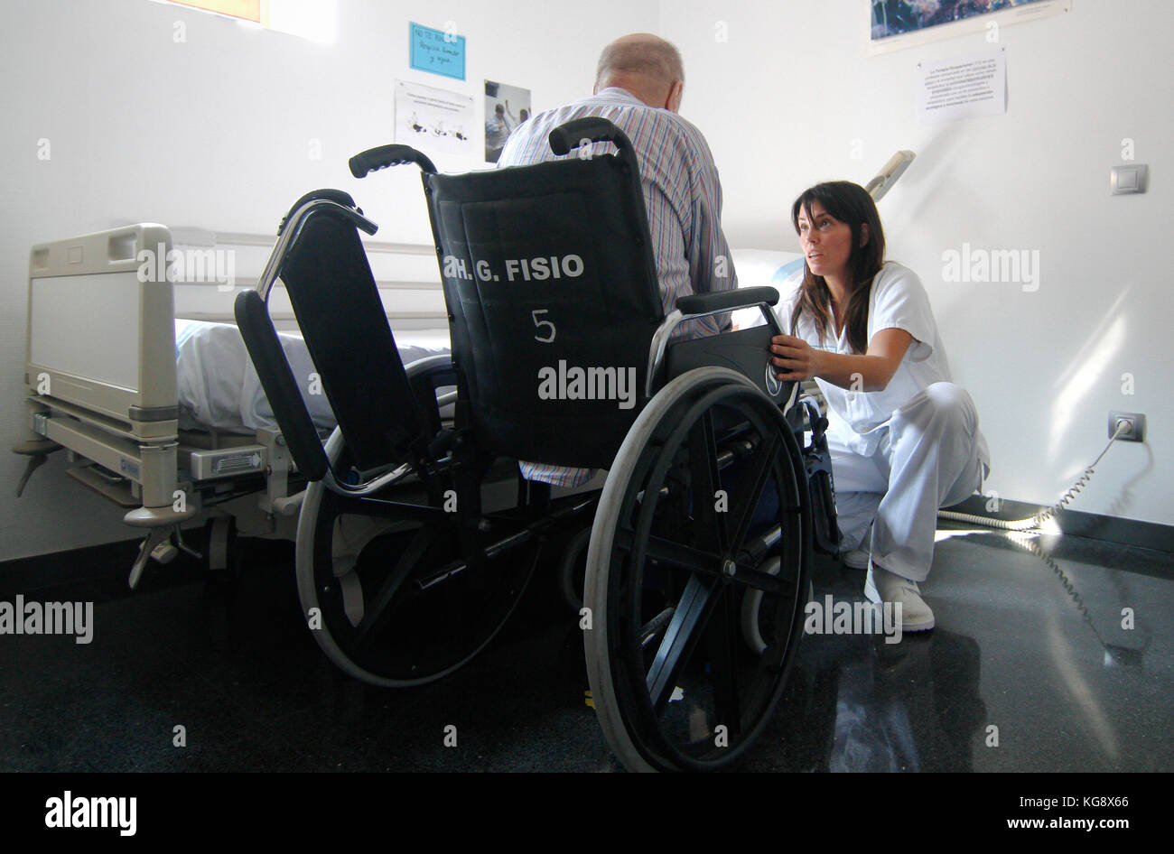 Patients who have suffered a stroke perform recovery activities with the help of nurses at the General Hospital of Palma in Mallorca, Balearic Islands Stock Photo